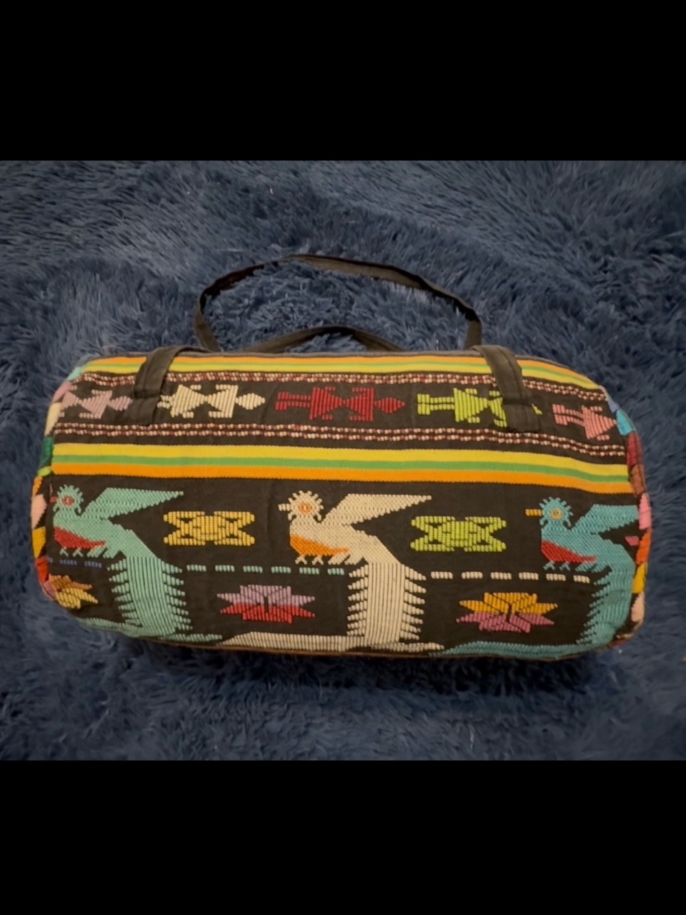 Guatemalan hand woven barrel shaped travel bag, used.
